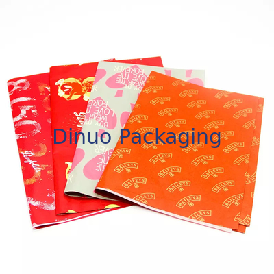 Weihnachtsgeschenkverpackung, die rote Seidenpapier-Verpackung mit Goldfolien-Druckblumen verpackt