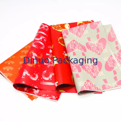 Weihnachtsgeschenkverpackung, die rote Seidenpapier-Verpackung mit Goldfolien-Druckblumen verpackt